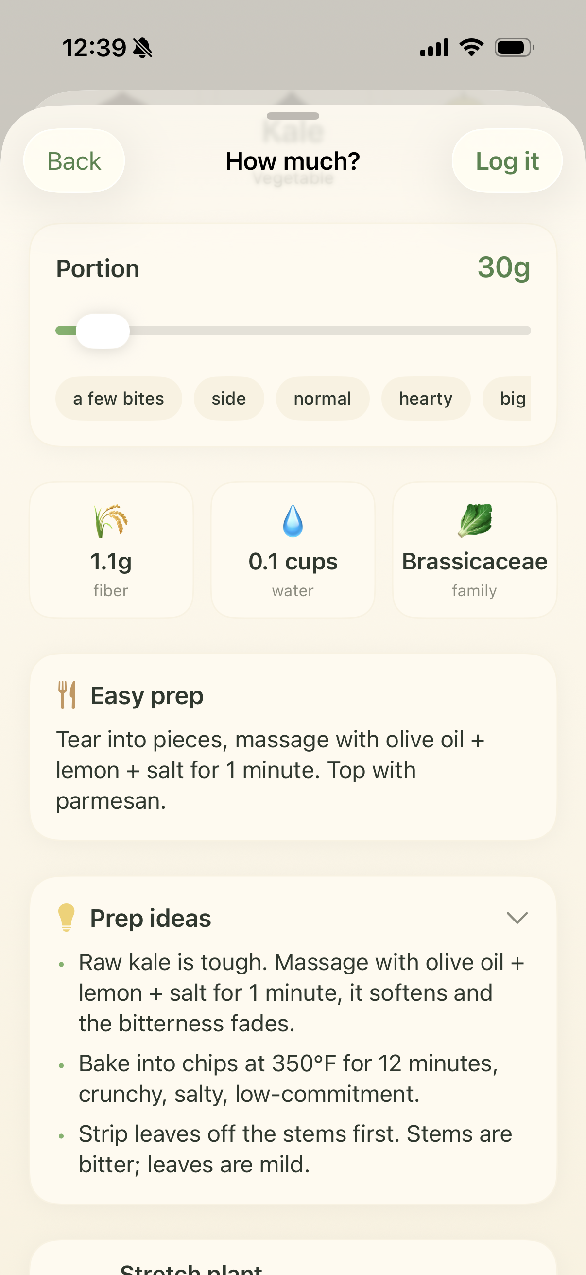 Kale detail screen with a portion slider, fiber and water, plant family, and easy prep ideas